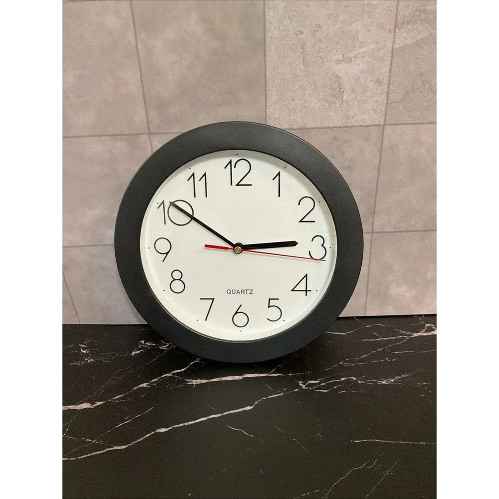 Universal Wall Clock 9 3/4 In Diameter Black Case